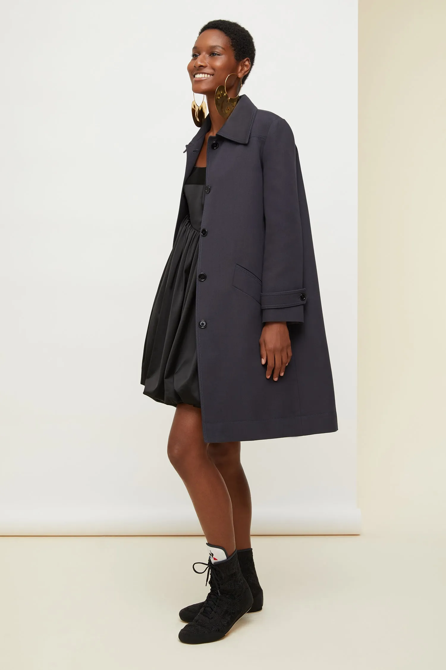 Ruffle hem gabardine coat