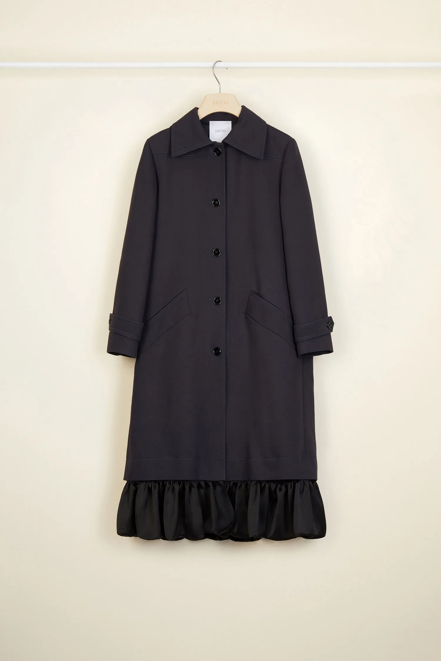 Ruffle hem gabardine coat