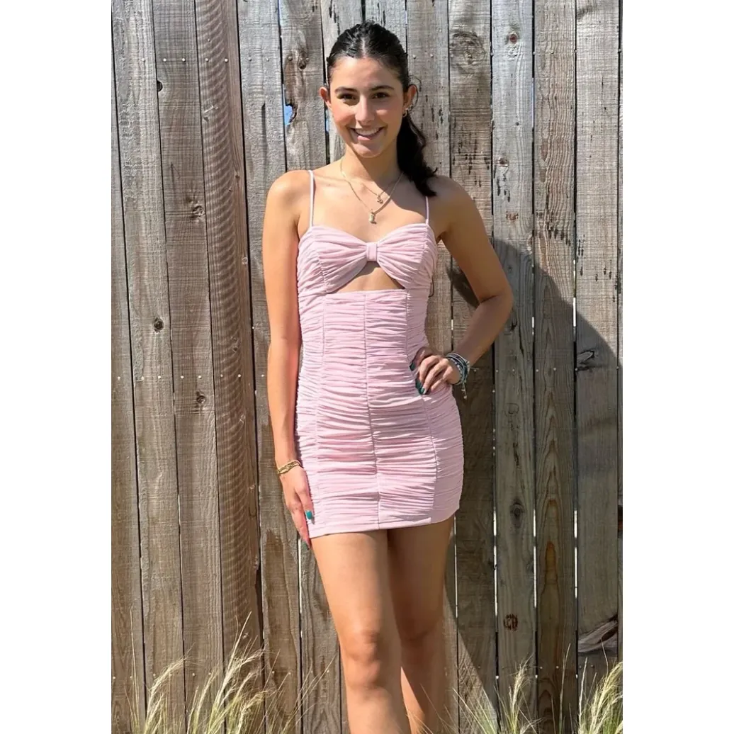 The Krista Light Pink Ruched Mesh Cutout Midriff Bow Mini Dress